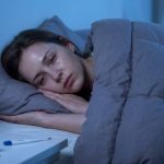 Person experiencing lingering fatigue after illness recovery in Houston